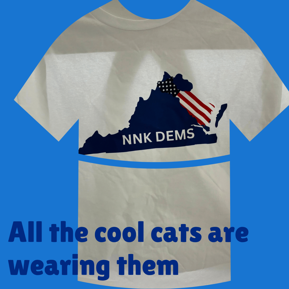 White tshirt with shape of state in navy and the NNK highlighted with the American flag. At the bottom of the state shape are the words NNK Dems
